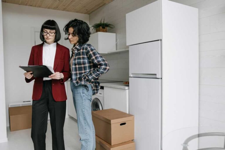 homeowner review results of home inspection with home inspector