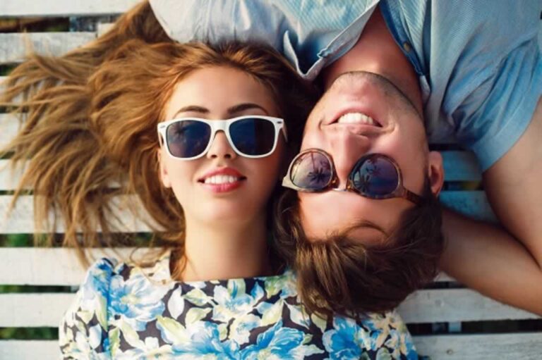 couple wearing prescription sunglasses