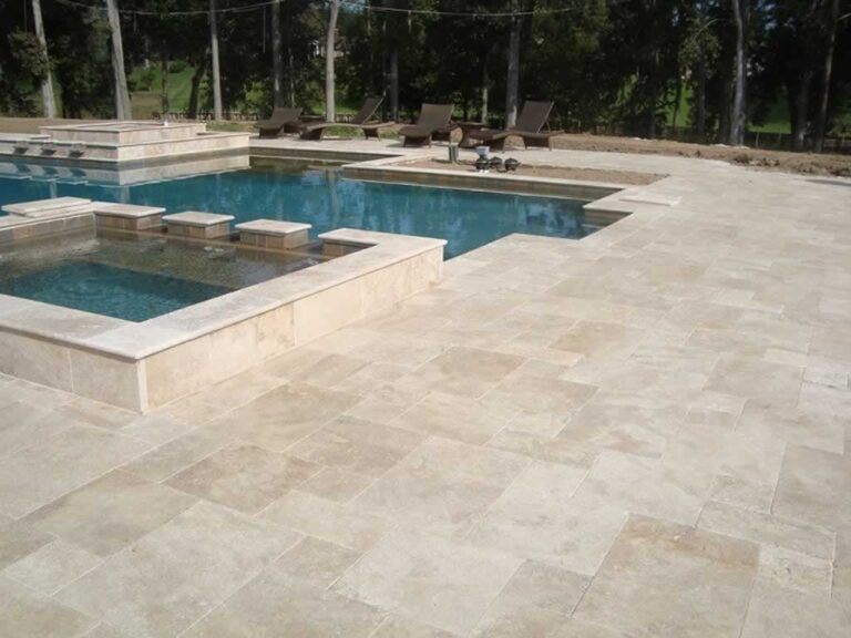 backyard with a pool and paved deck