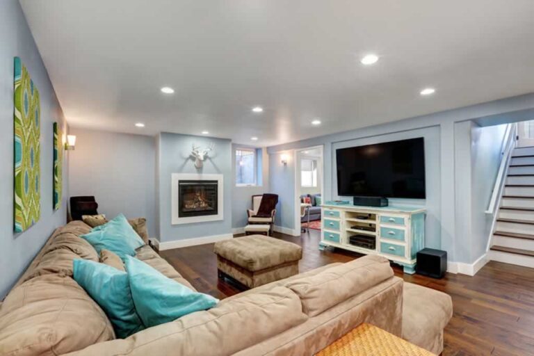 amazingly remodeled basement with living room and fireplace