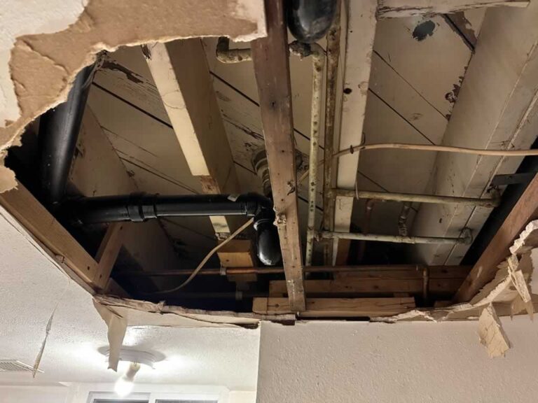 collapsed ceiling due to a leaking pipe