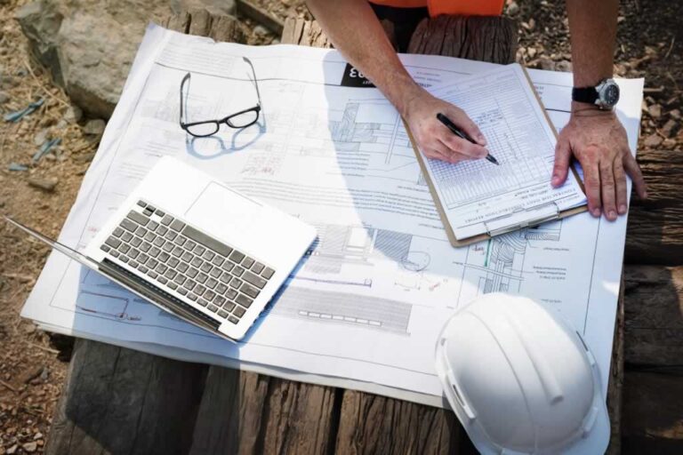 building plans and permits on the table