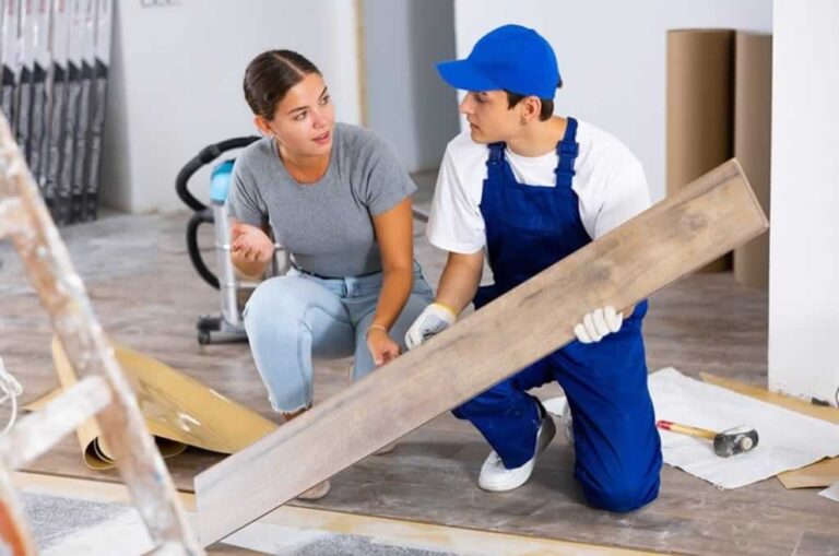 handyman repairing flooring