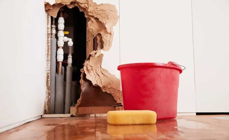 water damage in the wall because of a leaking pipe