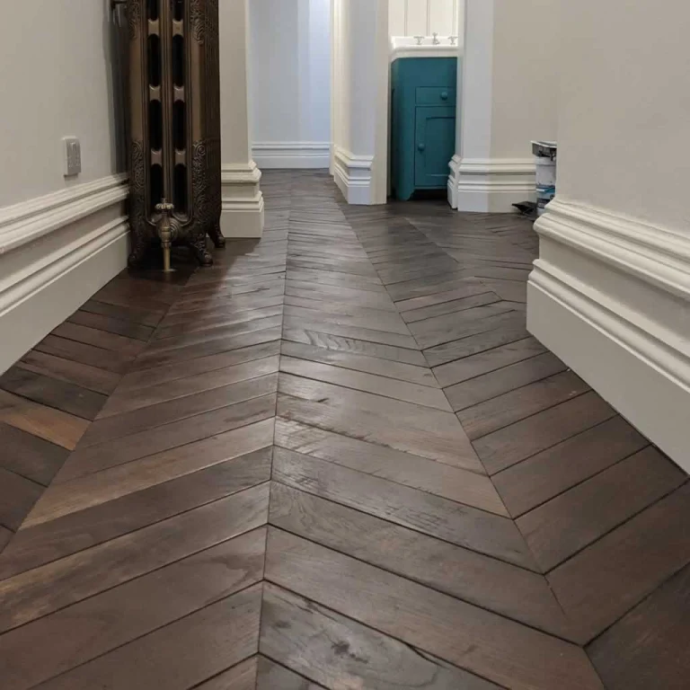 classic highly decorated skirting boards on wooden floors
