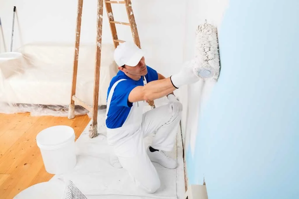 house painter painting interior wall
