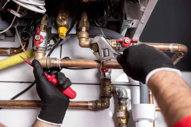 gas line plumber repairing pipes