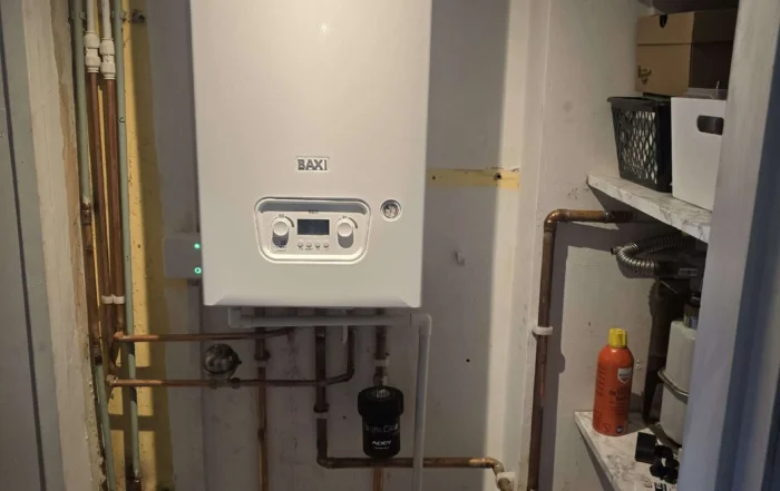 newly installed heating boiler in storage room