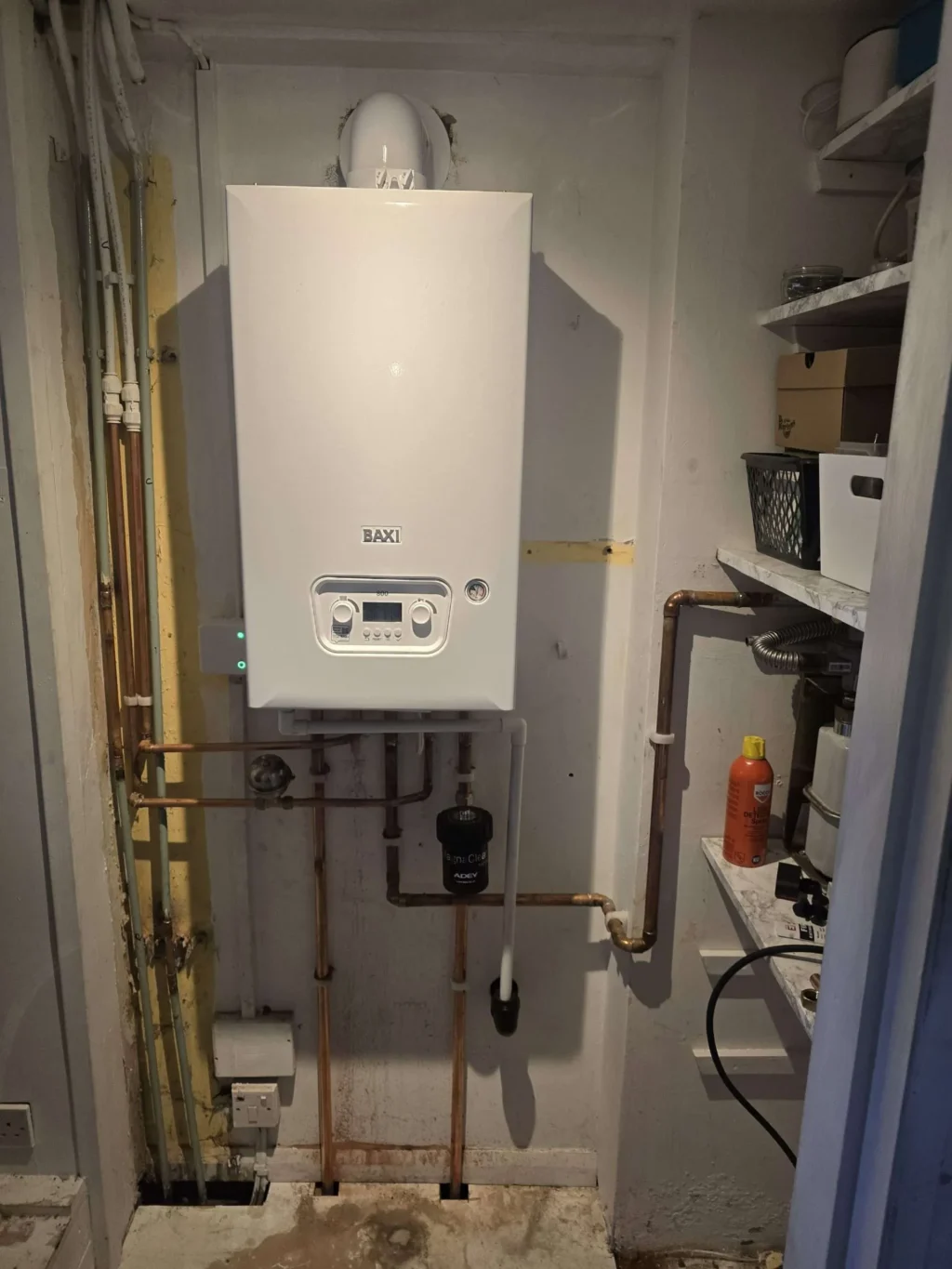 newly installed heating boiler in storage room