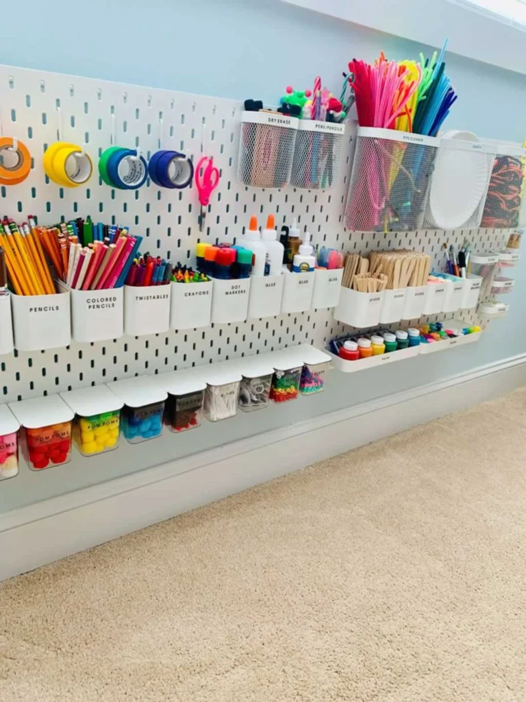 very organized craft room with wall shelves