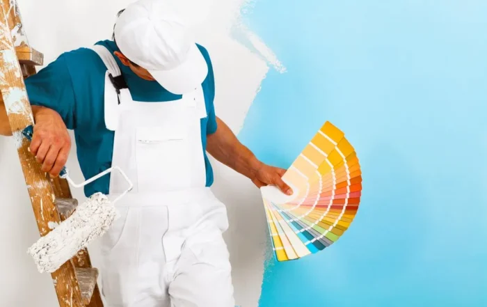 house painter showing a color pallet