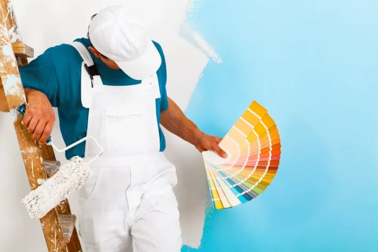house painter showing a color pallet