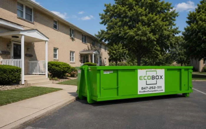 empty dumpster in front of the building