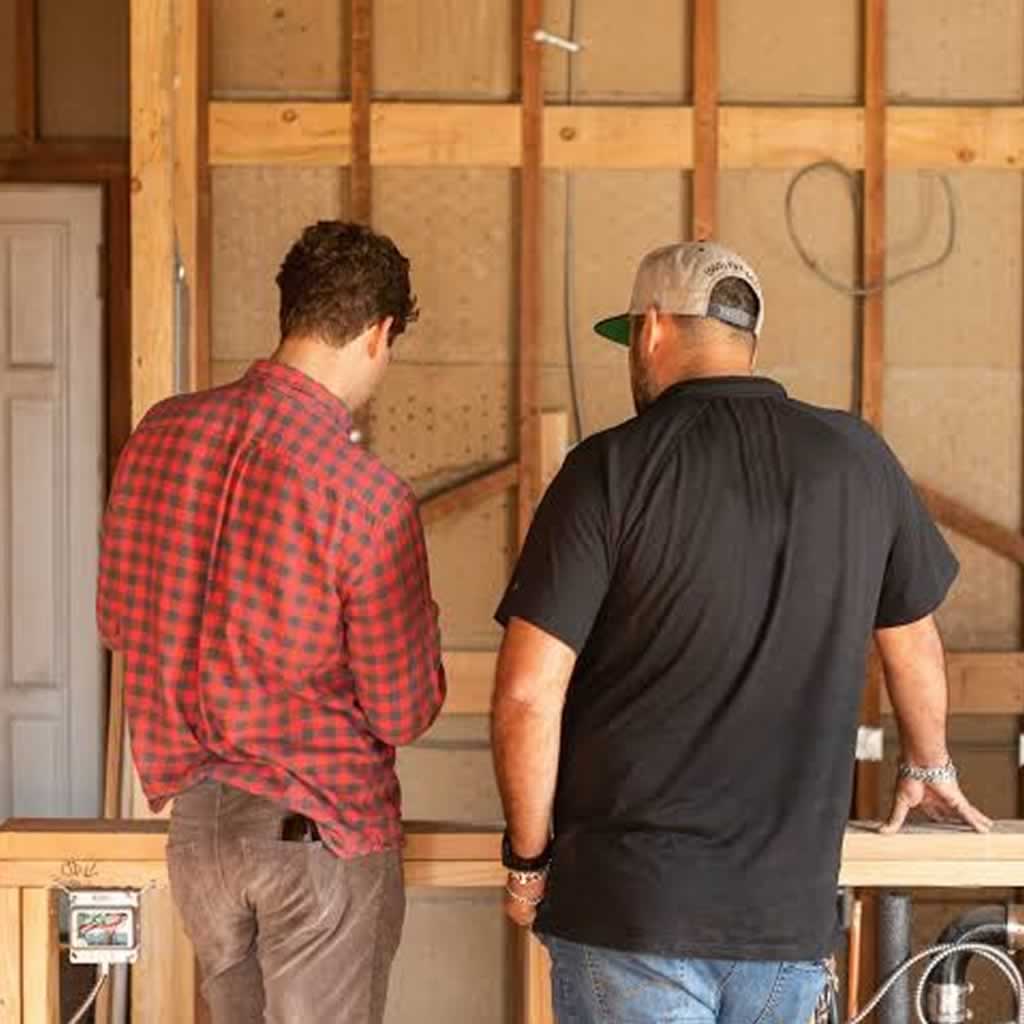 two men doing home remodel DIY style