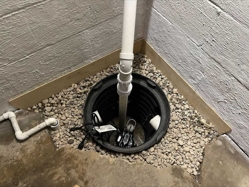new sump pump installation in the basement