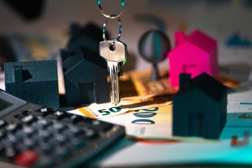key of the new real estate and money for property tax on the table